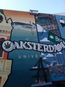 A "For Lease" sign now sits on the Oaksterdam mural on the side of the school's building.